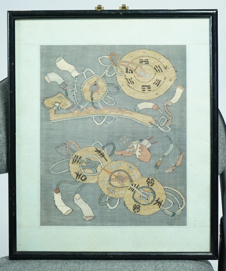 An early 20th century framed Chinese Kesi panel, woven with large amulets, eight trigrams and a Ruyi sceptre and good luck symbols, often given to a new born baby. 24cm wide x 30cm high. Condition - some very light fadin